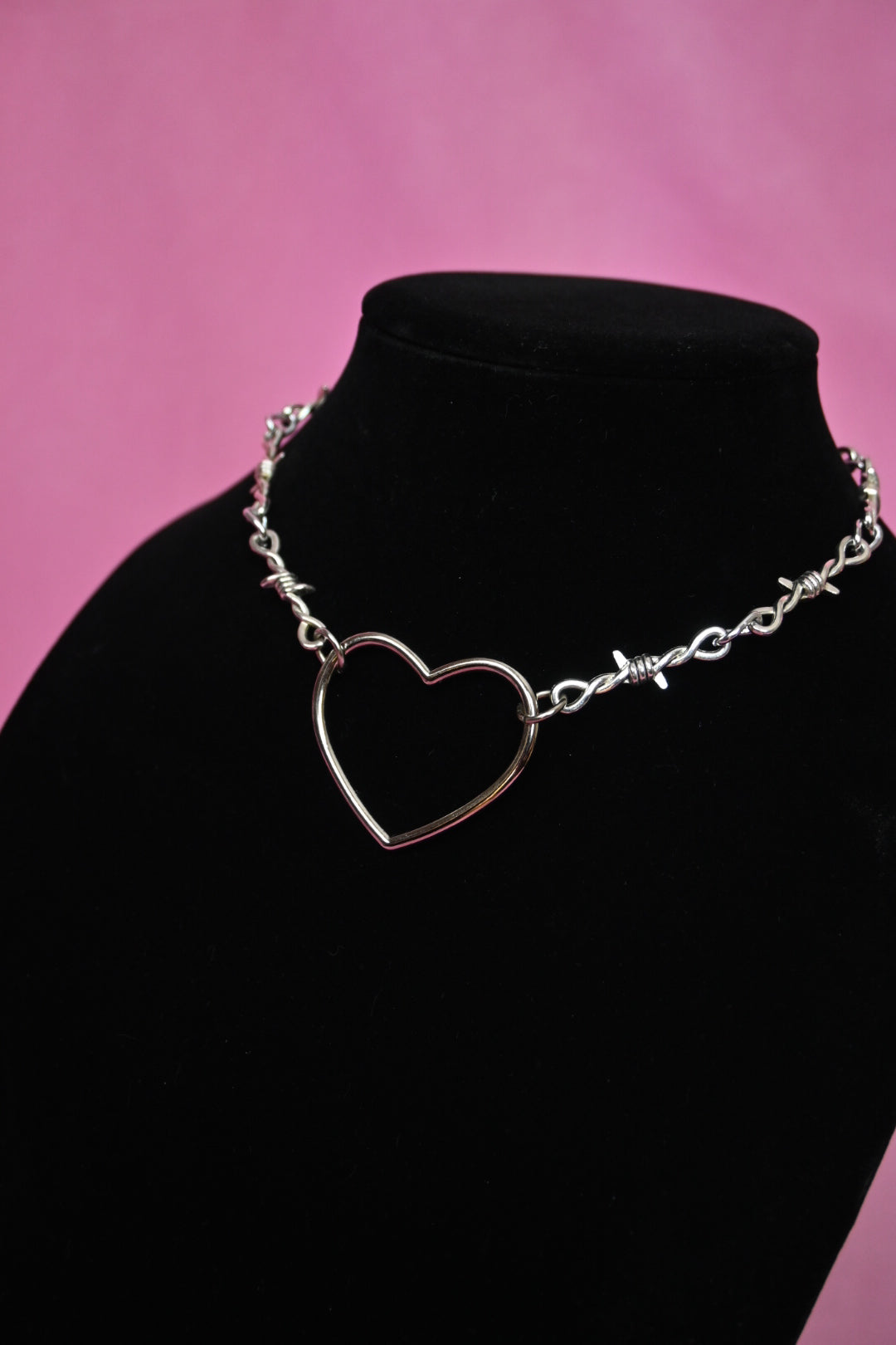 Barbed wire heart choker
