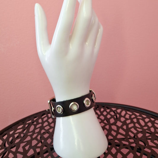 Grommet cuff faux or leather
